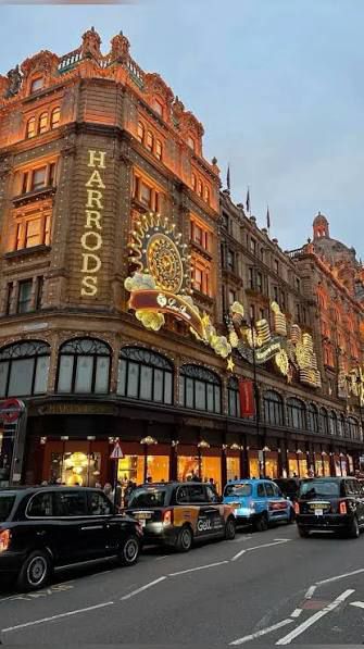 The Harrods facade at dusk, Brompton Road
